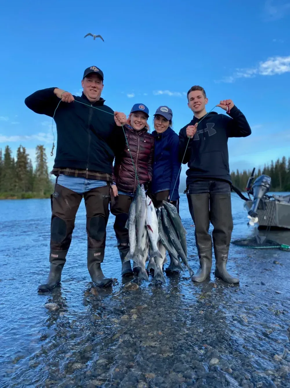 Family with sockeye salmon limit at Russian River